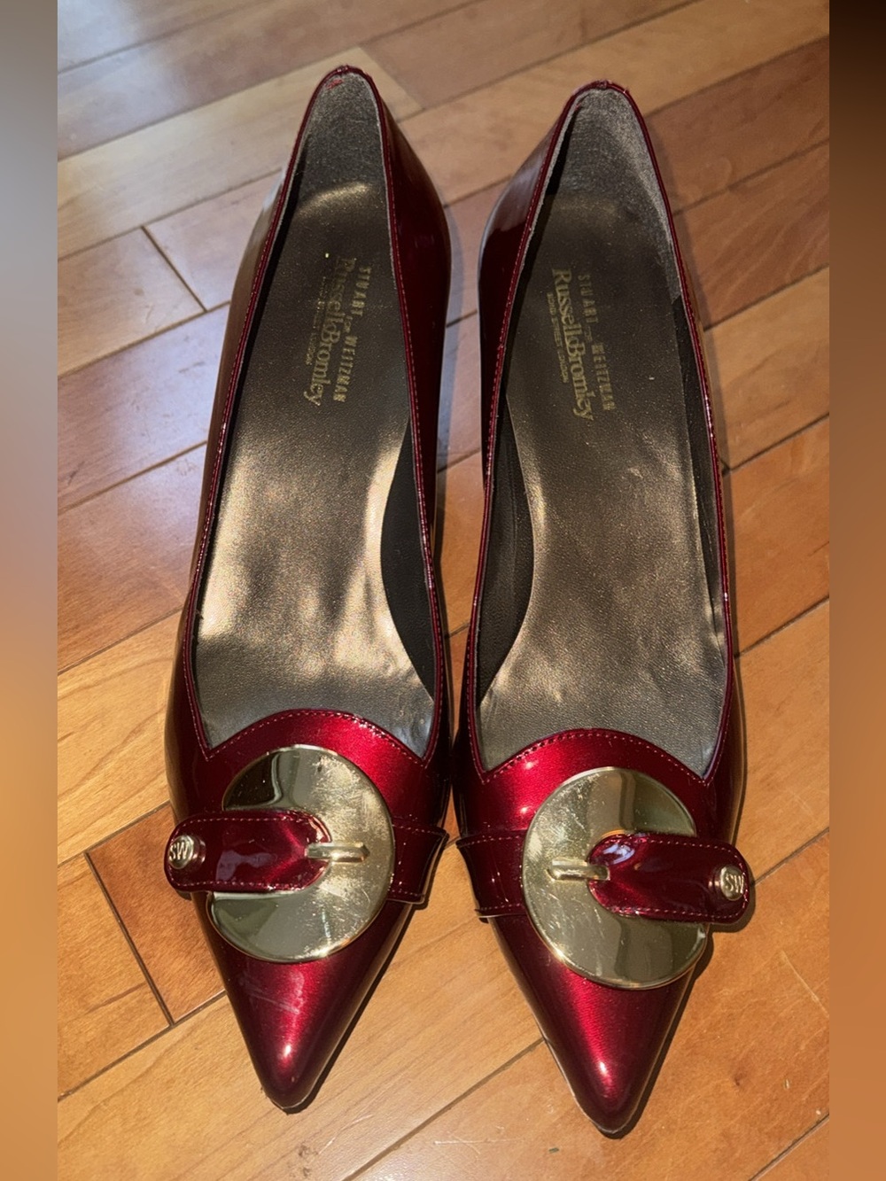Stuart Weitzman Burgundy Patent Pointed Toe Pumps with Gold Discs